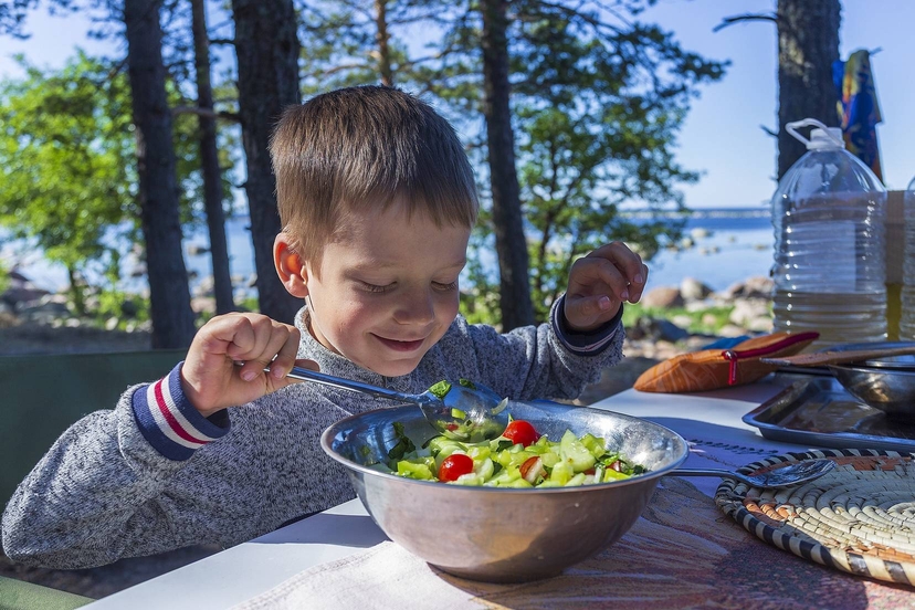 Boy is eating. Image courtesy: pexels.com